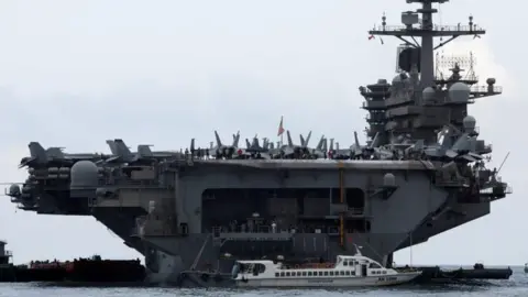 Reuters The USS Theodore Roosevelt enters port in Vietnam