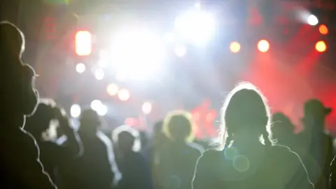 Getty Images Anonymous partygoers at a nightclub