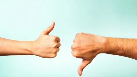 Getty Images thumbs up thumbs down