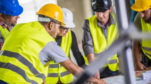 Getty Images Construction workers