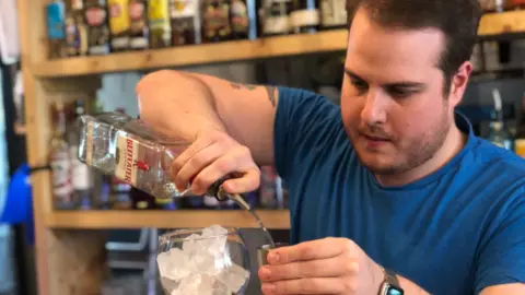 Matt Smith preparing a drink at Brain Jar