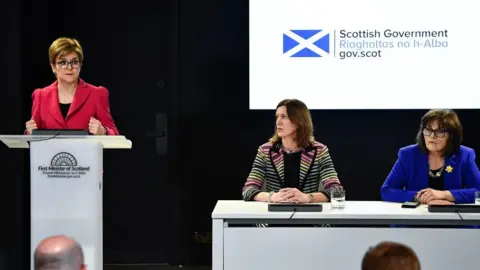 Getty Images Nicola Sturgeon, Catherine Calderwood and Jeane Freeman