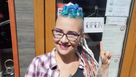 Jules Lee at her tattoo shop