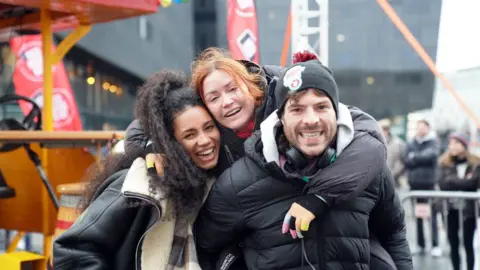 Comic Relief/PA Vick Hope (left) and Jordan North with Radio 1 host Arielle Free