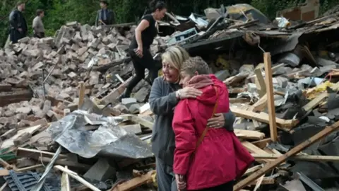 BBC Campaigners at the site of the Crooked House ruins