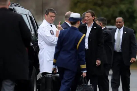 EPA Dr Ronny Jackson gives a thumbs-up after outside Walter Reed National Military Medical Center in Bethesda, Maryland, 12 January 2018