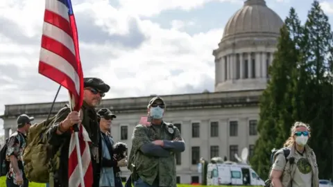 Getty Images Protestors in Washington hold rally against order to stay at home (19/04/20)