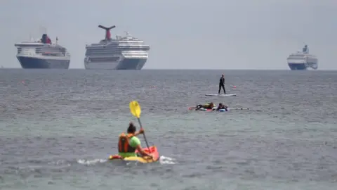 PA Media Cruise ships off the coast of Portland