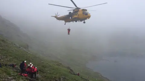 Patterdale Mountain Recue Team Helicopter over Helvellyn