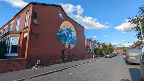 Lynda Sterling - OT Creative Space Amy Coney's mural A Better Tomorrow - Together We Stand