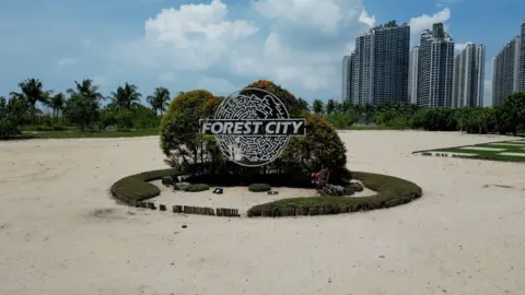 Sign to Forest City