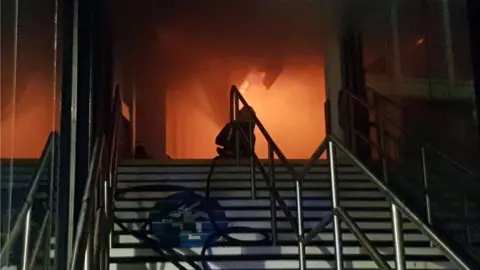 Nottinghamshire Fire and Rescue Service Fire glow inside the building