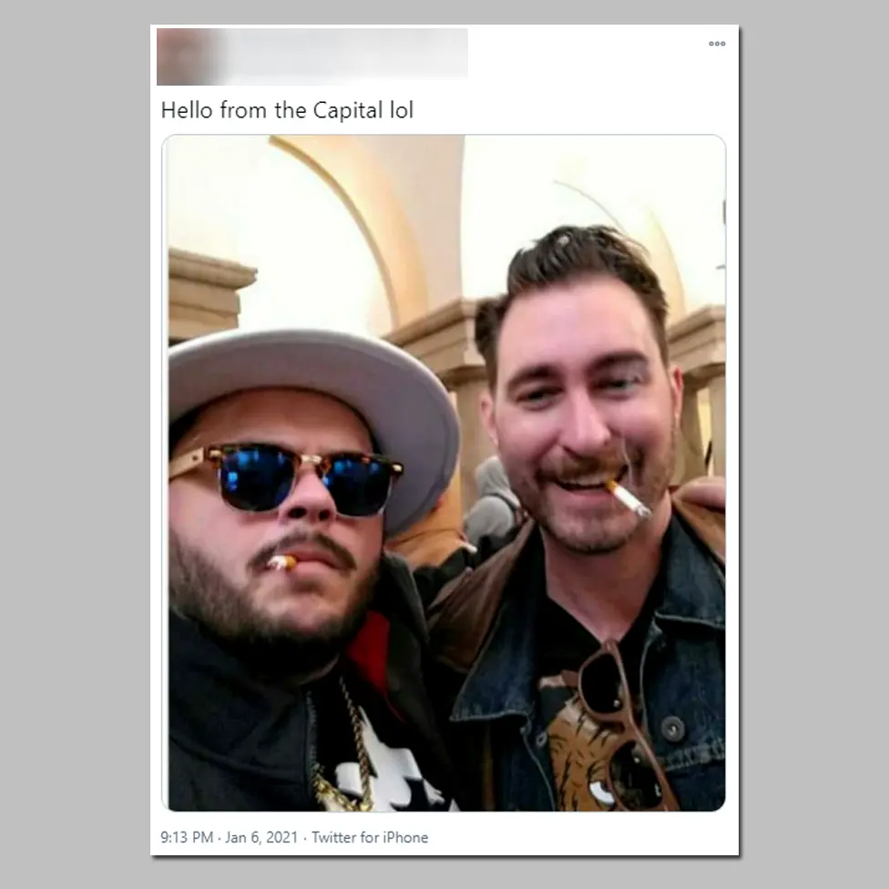 The individual on the right is Nick Ochs, who describes himself as a "Proud Boy Elder".