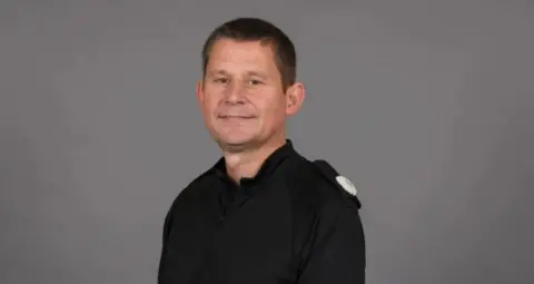 Northamptonshire Police Police officer looking at camera