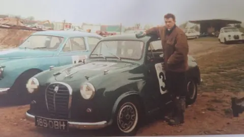 Sharpe family Will Sharpe, aged 16, cleaning his Dad's A35 at Snetterton Circuit on the day it crashed