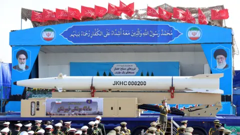 EPA A truck carries an Iranian missile Kheibar Shekan during the annual military parade marking the Iraqi invasion in 1980, which led to an eight-year-long war (1980-1988); in Tehran, Iran, 21 September 2024.