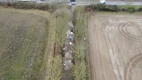 Pile of waste near road