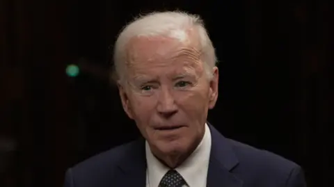 Image shows Joe Biden being interviewed by Nick Robinson