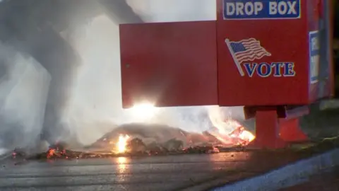 Ballots burning wrong  a ballot driblet  container  successful  Vancouver, Washington