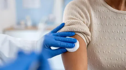 Woman gets vaccine