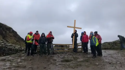 Margaret Williams Walkers at the site of Sycamore Gap