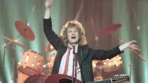 The British Rock and Pop Awards : 1984 - Picture shows : Noddy Holder performing 'My Oh My' with Slade.