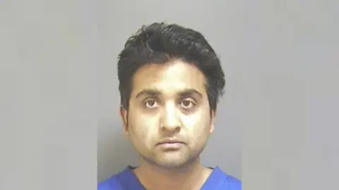 Devon and Cornwall Police Police custody shot of Salil Korambayil