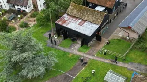 Steve Hubbard/BBC Aerial image of barn at farm