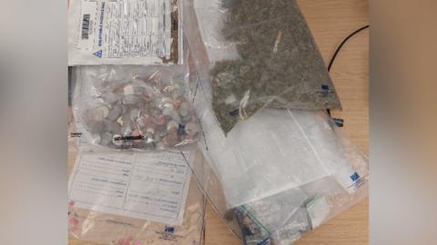Drugs and cash seized by police
