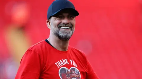 Jurgen Klopp takes Anfield acclaim after his last match as Liverpool manager
