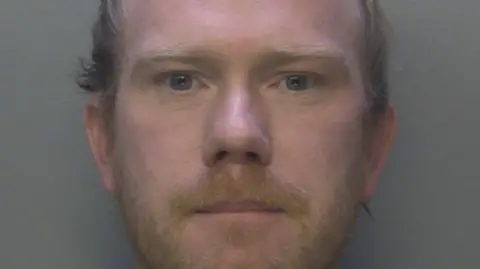 Man who raped young Surrey girl jailed for 18 years