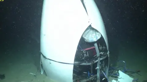 Picture shows Titan submersible's tail cone on the sea floor