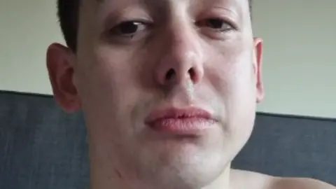 Handout Man looking at camera