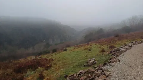 Daniel Mumby/LDRS Path on the northern side of Cheddar Gorge in the Mendip Hills. The photo has been taken on a very foggy day.