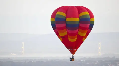 A multi-coloured hot air balloon 
