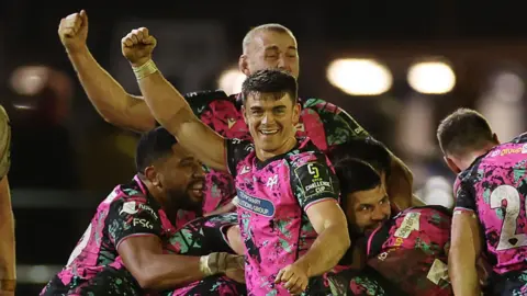 Reuben Morgan-Williams celebrates after Ospreys beat Connacht in Bridgend