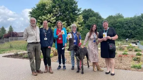 Volunteers and NHS staff at Oakwood Recovery Nature Garden.