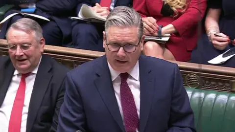 Keir Starmer standing in the House of Commons.