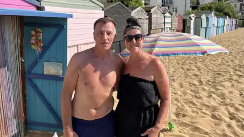 Phil Harrison/BBC Gary and Michelle Hams on Broadstairs beach