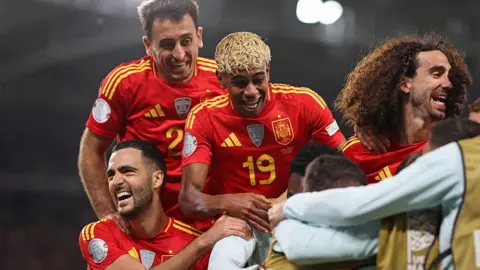 Spain celebrate a goal