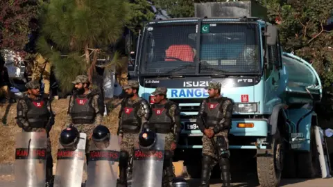 Rangers take positions as supporters of the opposition Pakistan Tehrik-e-Insaf (PTI) party of jailed former Prime Minister Imran Khan, as they continued the protest for the second day, demanding the release of Khan, in Islamabad, Pakistan, 25 November 2024.