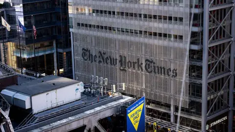 The sign on the New York Times building