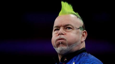 Peter Wright reacts during the 2024 Premier League Darts