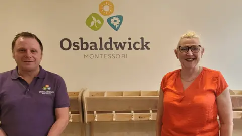 Hayley Coyle/BBC Neil Collins and Nancy Kotecha