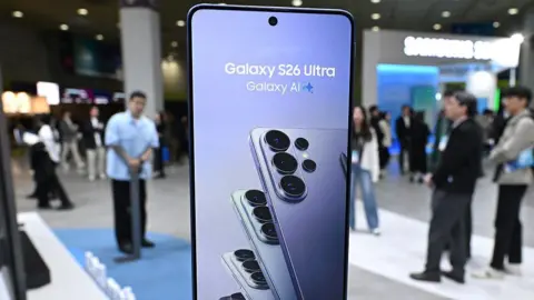 AFP via Getty Images A Galaxy S26 Ultra smartphone is displayed at the Samsung booth during the 2026 World IT Show in Seoul on 22 April, 2026.