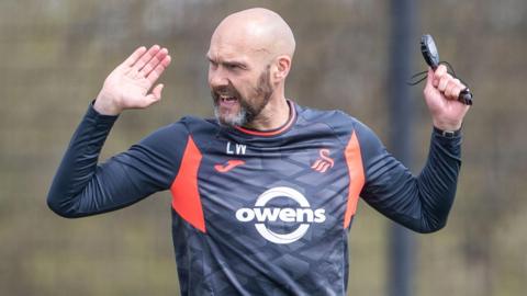 Swansea boss Luke Williams gesticulates in training