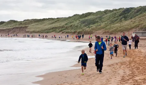 Parkrun People on a beach Parkrun in 2015