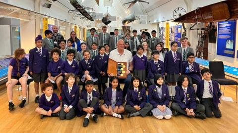 Sir Steve Redgrave and pupils from a local school at the River and Rowing Museum exhibition