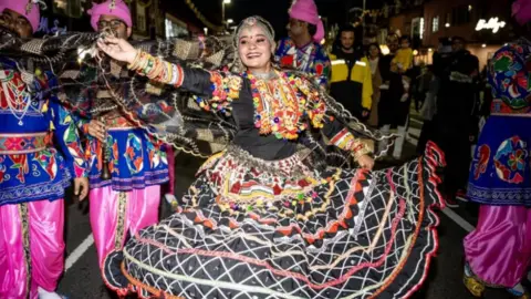 A dancer at Diwali celebrations in Belgrave Road, Leicester