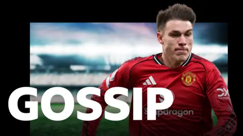 Manuel Ugarte in action for Manchester United behind a banner saying gossip